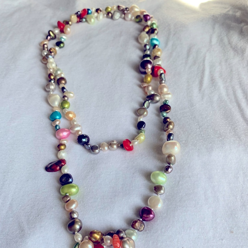 Multi colored pearls necklace/belt. single strand approximately 4 feet long